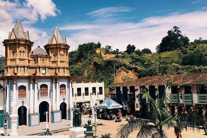 Amazing Private Guatape Tour + Boat Ride + Helicopter & Rock - Malecon de Guatapé and a colorful plaza: where the town personality shows up