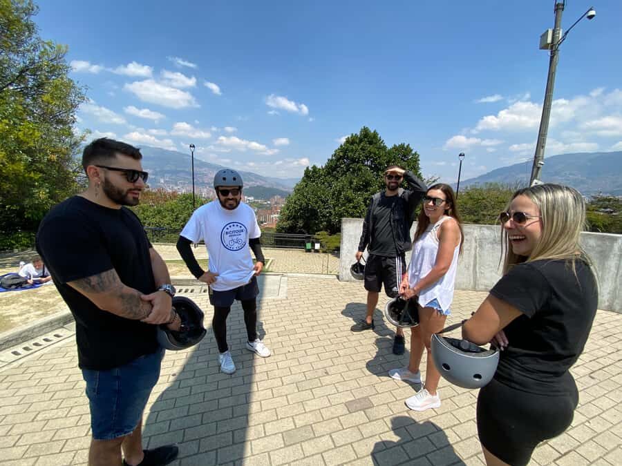 E-Bike City Tour Medellin with Local beer and Snacks - Conquistadores: learning the city through everyday streets
