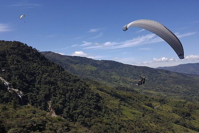 Fun RAFTING + Awesome PARAGLIDING over giant waterfalls from MEDELLIN - Meet the guide team and set your expectations