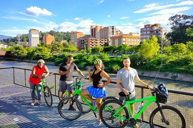 Half Day Bike Tour in Medellin - Local snack, Coffee or Beer - Parques del Río: riding by the river that splits the city