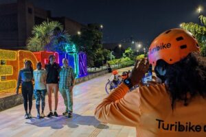 Medellín Christmas Lights E-Bike Tour with Snack & Donation - Meeting Point in El Poblado: Getting There Without Wasting Time