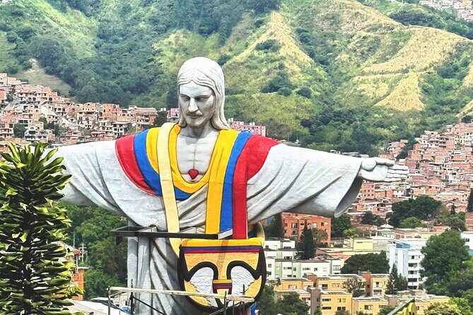 Medellin communal tour 13 with snacks and your own graffity - Upper views and the viaduct path: photos, souvenirs, and local food time