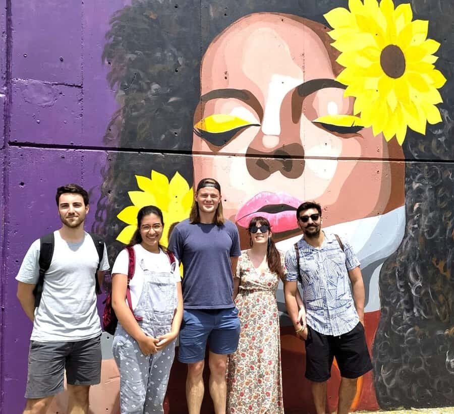 Medellín: Comuna 13 District Tour with Cable Car Ride - The short bus segment: arriving with less fatigue