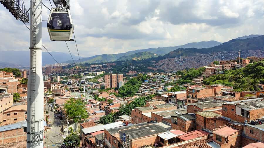 Medellin: Comuna 13 Graffiti Tour, Cable Car & Street Food - Walking the graffiti streets: learning to read murals