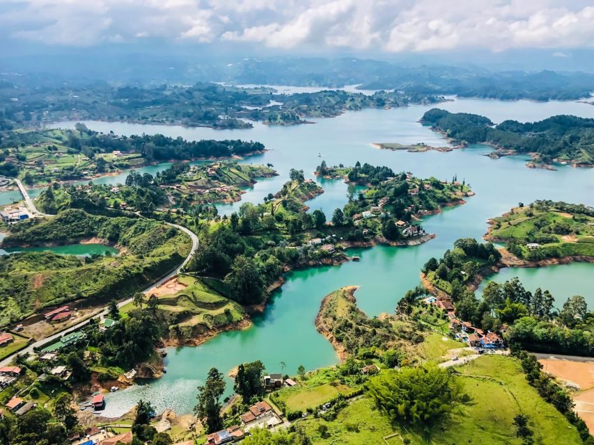 Medellin: Guatapé Day Trip & Boat to Pablo Escobar's Estate - Guatapé town: color streets, guided walk, and time to roam