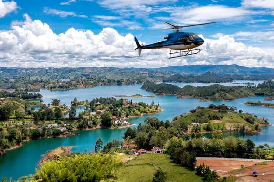 Medellín: Guatapé Private Tour with Helicopter & Boat Ride - The Rock of Guatapé (La Piedra): Stairs, Sweaty Legs, and a Ticket Extra