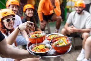 Medellín: Local neighborhoods and included food on e-bike - Start in El Poblado at Turibike and get rolling