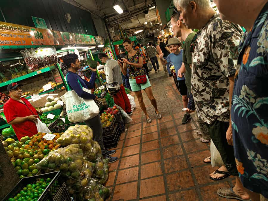 Medellín Multi-sensory Tour in the market, +15 Exotic Fruits - Walking the first stretch: a photo stop plus early tastings