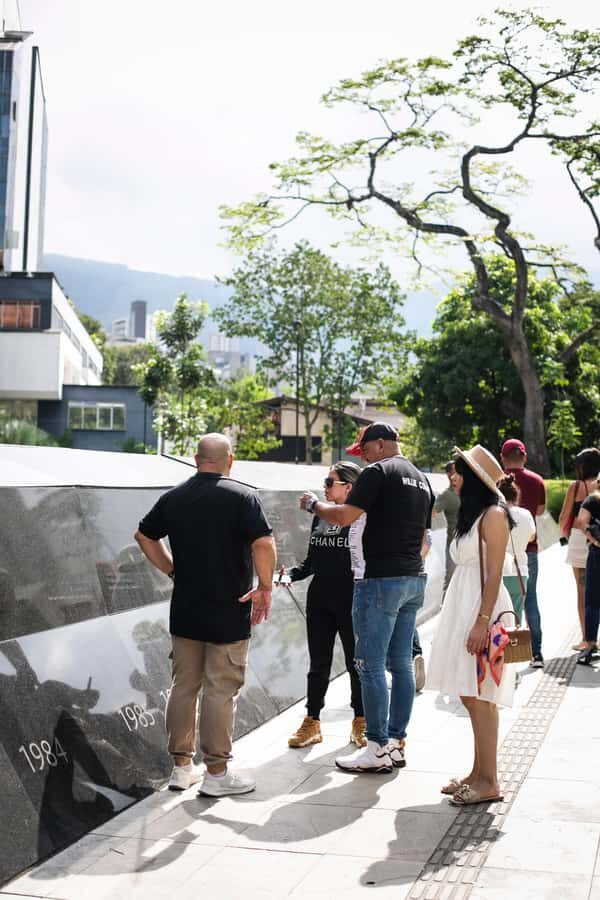 Medellín: Pablo Escobar Tour with Guide and Transportation - Stop 1: Virgen Rosa Mystica Photo Stop and Guided Orientation