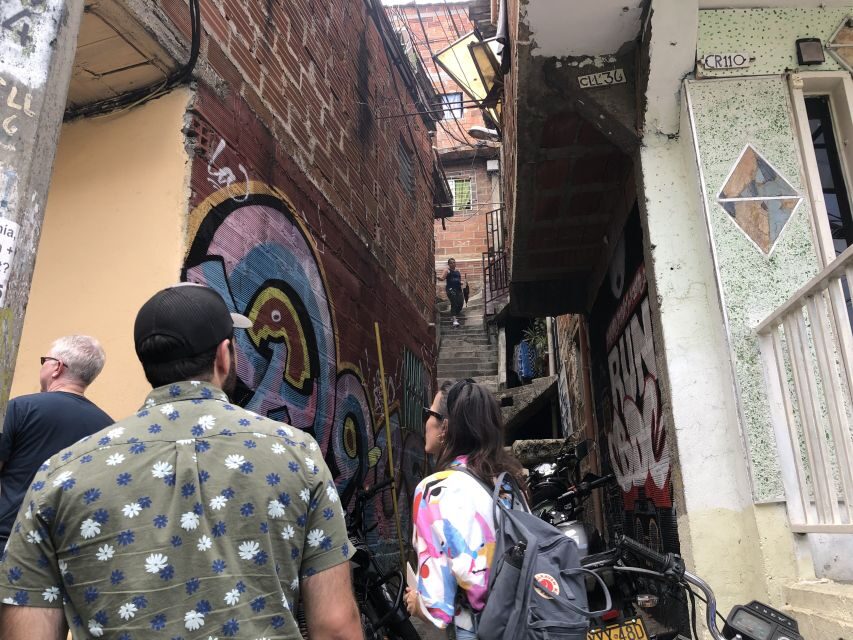 Medellín: Private Comuna 13 Street Art Tour - Food, the mango ice pop, and keeping your energy up