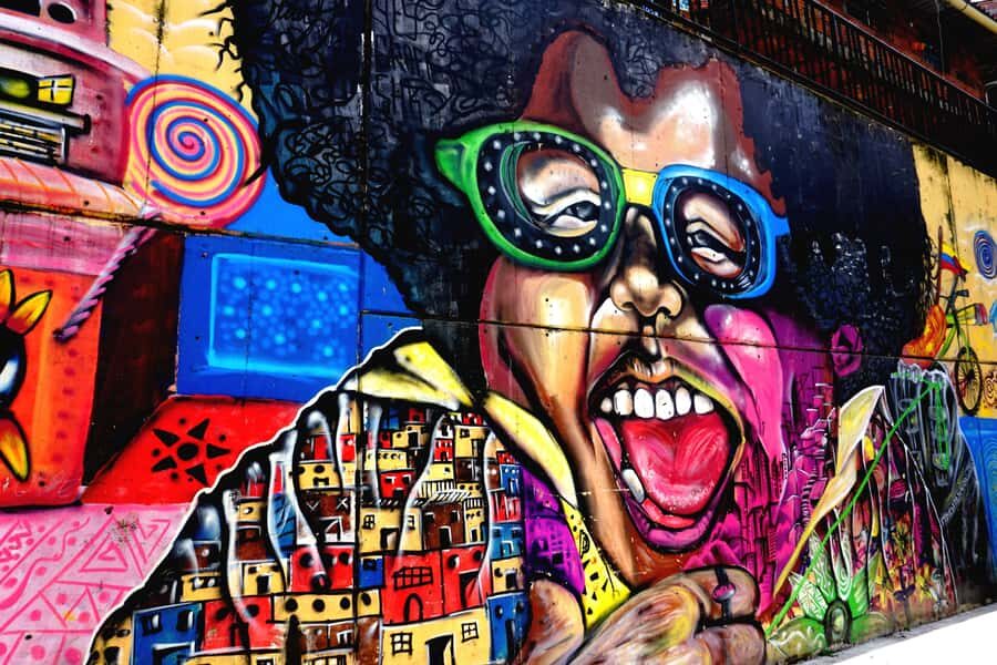 Medellín: Private Comuna 13 Street Art Tour - First murals in Poblado: learning to read the walls