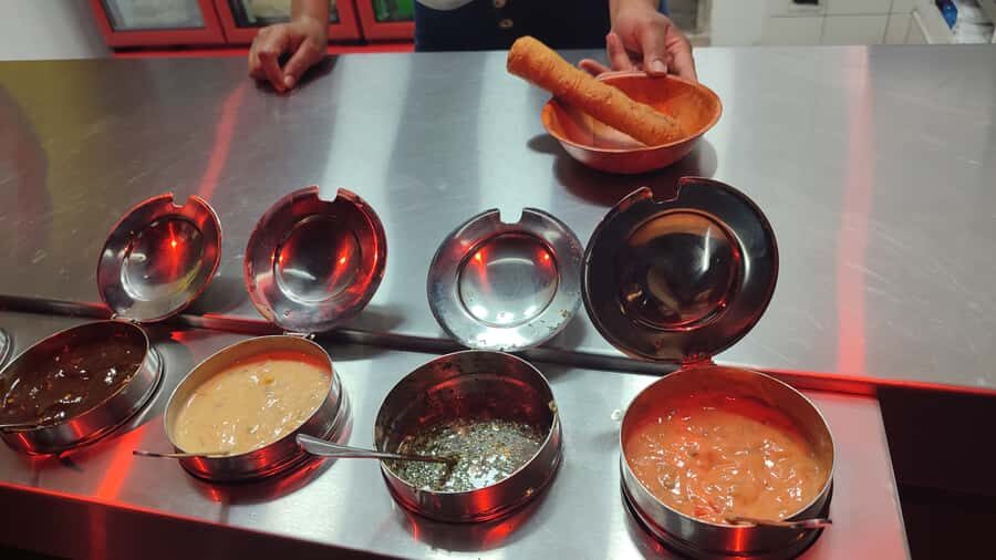 Medellin: Street Food and Poblado Rooftop Tour with a Local - Five Colombian Street Snacks: What You’re Really Paying For