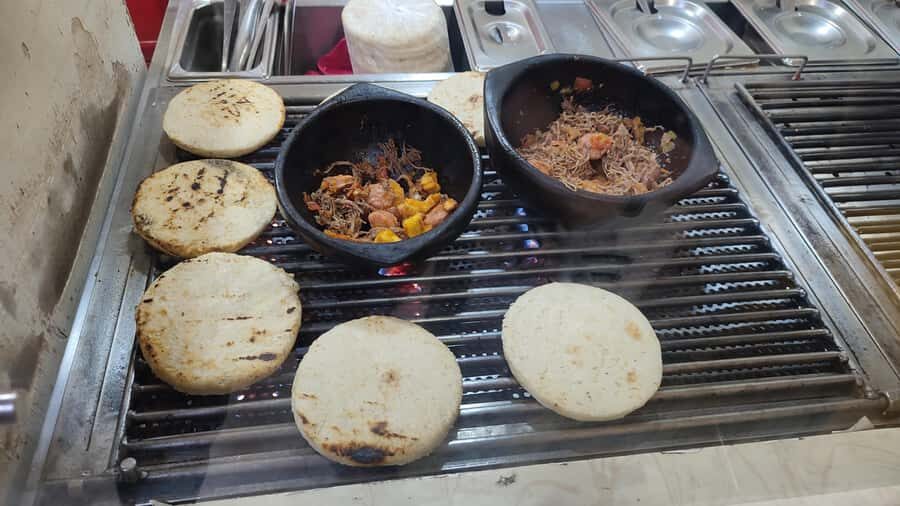 Medellin: Street Food and Poblado Rooftop Tour with a Local - Vendor Encounters: The Human Side of Street Food