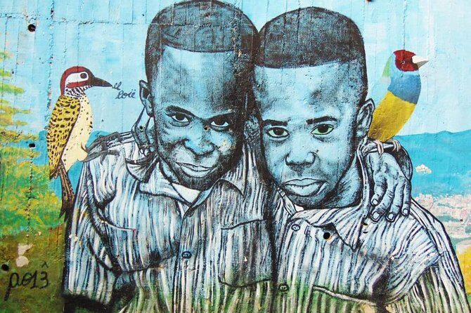 Pablo and Comuna 13 with Cable Car - Comuna 13 and the Electric Escalators: More Than Street Art