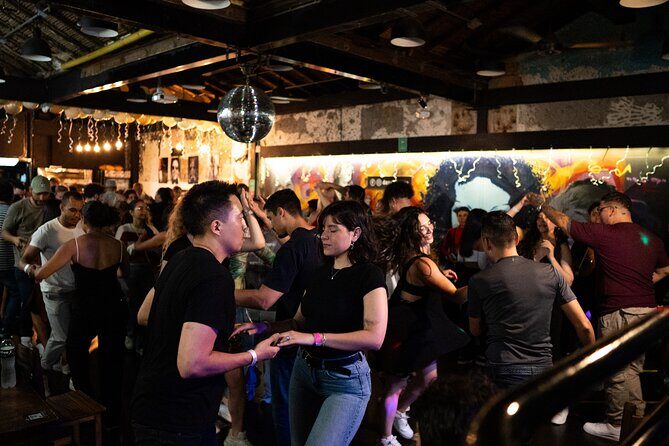 Salsa & Bachata Nightlife Tour in Medellín with a Local Dancer - Rooftop break and drink expectations: what’s cultural, what’s optional